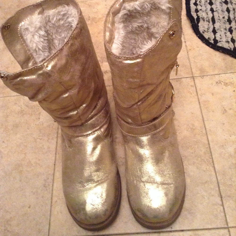 Gold boots by GUESS